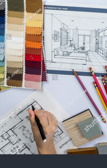 stock-photo-top-view-of-architects-hands-drawing-of-modern-house-with-material-sample-on-creative-desk-304391486